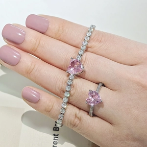 Elegant silver jewelry set with pink heart zirconia stone ring and tennis bracelet