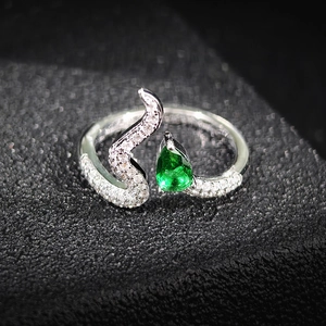 Silver snake design open ring with teardrop green gemstone and pavé crystal accents