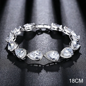 Elegante pulsera de plata de 18 cm con lujosas circonitas pera y rectangulares
