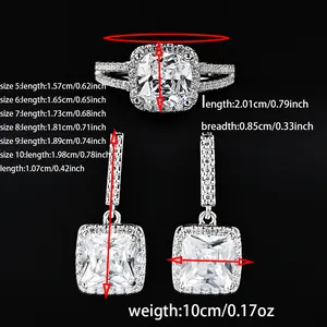Größentabelle für Schmuckset mit quadratischem Kristallring und Ohrhängern auf schwarzem Grund