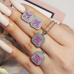 Elegant jewelry set with pink square-cut gemstones and sparkling zircon accents