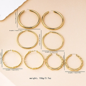 Set of four large gold-plated bamboo and hoop earrings for women in punk hip-hop style
