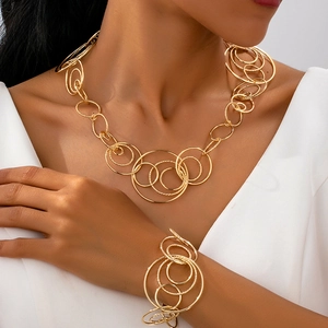 Irregular geometric circle necklace and bracelet set in polished hammered gold finish