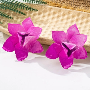 Detailed close-up of blooming rose purple floral stud earrings with matte pearl texture