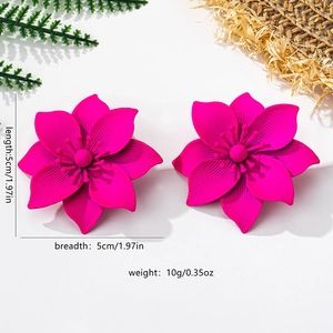 Detail shot of 5cm hot pink floral earring with matte finish and petal texture detail