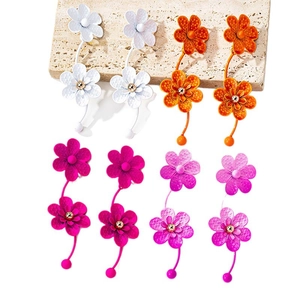 Oversized flower earrings in white, orange, rose, and purple with matte lacquer finish