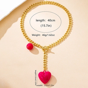 Chunky gold chain toggle necklace featuring a large magenta heart pendant for women