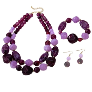 Vintage purple beaded jewelry set including layered necklace, bracelet and drop earrings