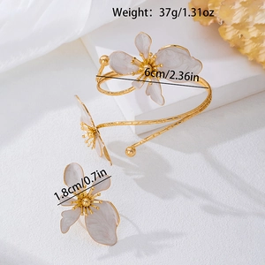 Golden flower jewelry set with white enamel petals for parties and daily wear