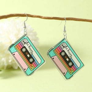 Retro mint green acrylic cassette tape earrings with Be Happy text on natural branches