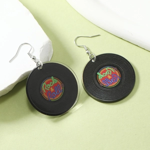 Detail of vintage vinyl record earrings with Rock & Roll print and silver hooks