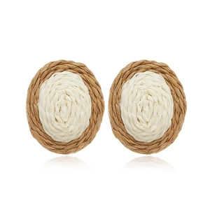 Creative bohemian oval raffia earrings in contrast brown and cream woven design