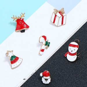 Christmas enamel pin set with Santa, reindeer and tree on a multicolored background