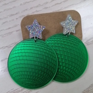 Retro neon green acrylic disco ball star drop earrings displayed on a craft card