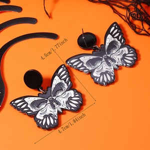 Detail view of butterfly skull earrings with 4.5cm by 4.7cm size measurement overlay