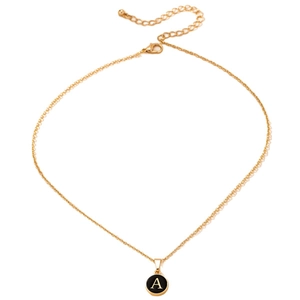 Elegant gold initial A necklace with black round pendant and adjustable lobster clasp