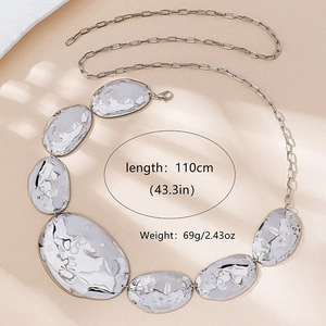 Close-up of silver irregular geometric metal waist chain with 110cm length details