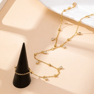 Bracelet de cheville doré avec breloques en cristal étincelant pour vacances d'été