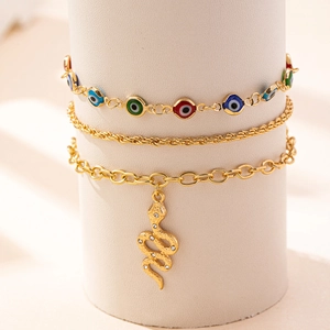Dreilagiges goldene Fußkettchen-Set mit bunten Evil-Eye-Perlen und einem Schlangenanhänger