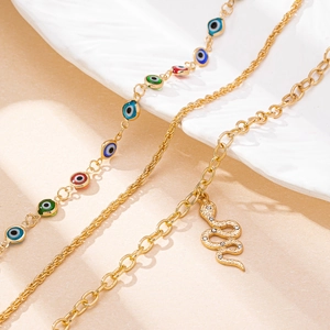 Böhmisches goldenes Fußkettchen-Set mit bunten Nazar-Perlen und Schlangen-Anhängern