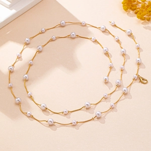 Elegant pearl waist chain for women with golden snake bone chain and round white pearls