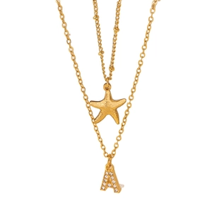 Collana doppia dorata con ciondolo a stella marina e lettera A impreziosita da diamanti