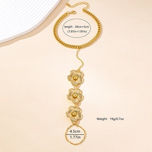 Bracelet bague fleur dorée avec chaîne gourmette et bagues pour style de plage chic
