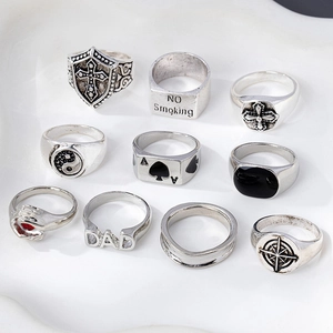 10-piece vintage silver alloy ring set with cross, yin yang, and poker spade designs