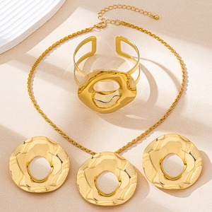 Golden jewelry set with hammered geometric circle pendant necklace, bangle and earrings