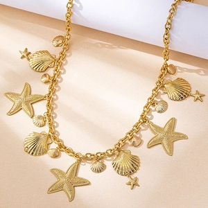 Detailed close-up of golden ocean-themed waist chain with starfish and seashell charms