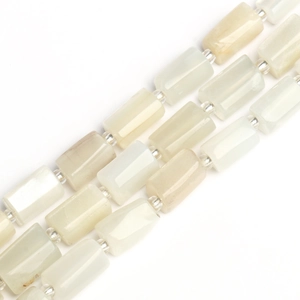 Macro view of rectangular white moonstone beads and silver spacers for DIY jewelry