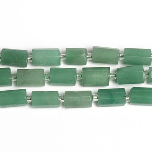 Macro shot of natural green aventurine rectangle tube beads for DIY jewelry making