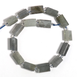 Rectangular grey labradorite gemstone beads with silver spacers on a blue cord string