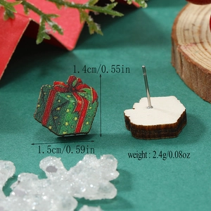 Detalle de pendientes de caja de regalo de Navidad en madera con medidas y peso