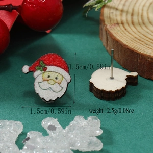 Primer plano de pendientes de madera de Papá Noel con dimensiones y detalle de peso ligero
