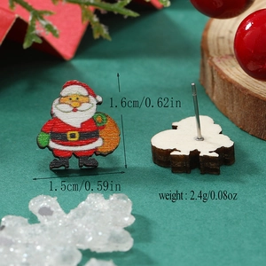 Detalle de pendientes de madera de Papá Noel con medidas precisas de tamaño y peso