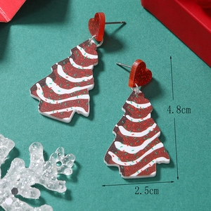 Détail des boucles d'oreilles sapin de Noël avec puces cœur et mesures de texture