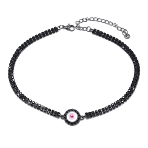Double-row black rhinestone choker featuring a gothic pink devil eye pendant in gunmetal