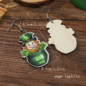 Detail of St. Patrick's Day leprechaun wood earrings showing front and back texture