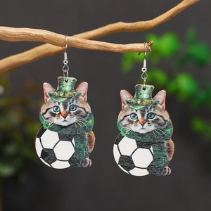 Saint Patrick's Day wooden earrings with cute cat wearing green hat leaning on a soccer ball