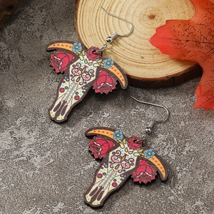 Ethnic wood drop earrings with hand-painted cow skull and red rose floral design