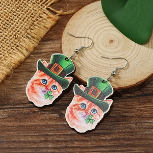 Detail of wooden cat earrings with green top hat and clover for St. Patrick's Day