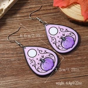 Detail view of acrylic Halloween teardrop earrings with pumpkin and moon, size 6.6cm x 3.2cm