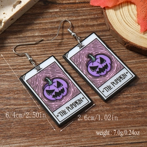 Detail view of Halloween acrylic tarot earrings showing dimensions of 6.4cm height