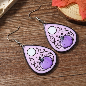 Detail of water-drop acrylic earrings with purple pumpkin and full moon pattern