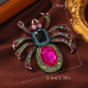 Pink oval crystal spider brooch with vintage gold finish and colorful rhinestones