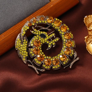 Vintage bronze dragon brooch with orange rhinestones on silk, zodiac totem pin accessory