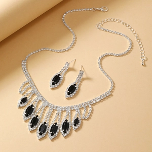Elegant silver bridal jewelry set with cascading rhinestones and black marquise stones