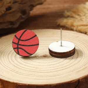 Detailed view of basketball wood stud earrings showing wooden texture and metal pins