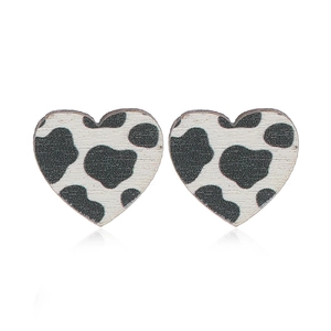 Minimalist wooden heart stud earrings with black and white cow print patterns for women
